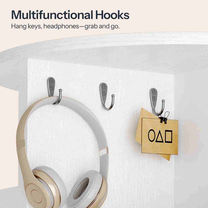 Three silver wall hooks mounted on a white shelf, shown with the text 'Multifunctional Hooks' and 'Hang keys, headphones—grab and go.' One beige over-ear headphone and a small paper tag are hanging from the hooks.