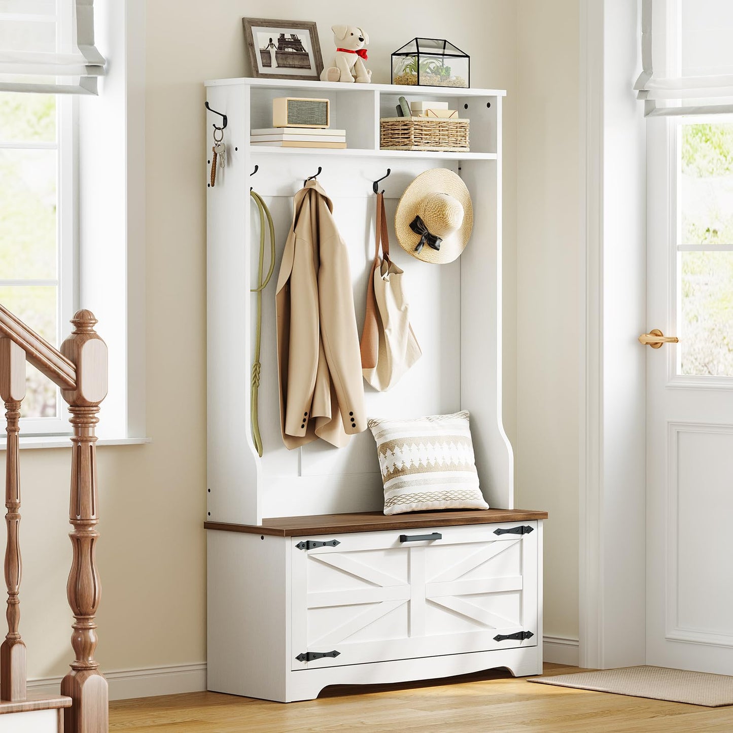 White hall tree with storage compartments and hooks in a home setting