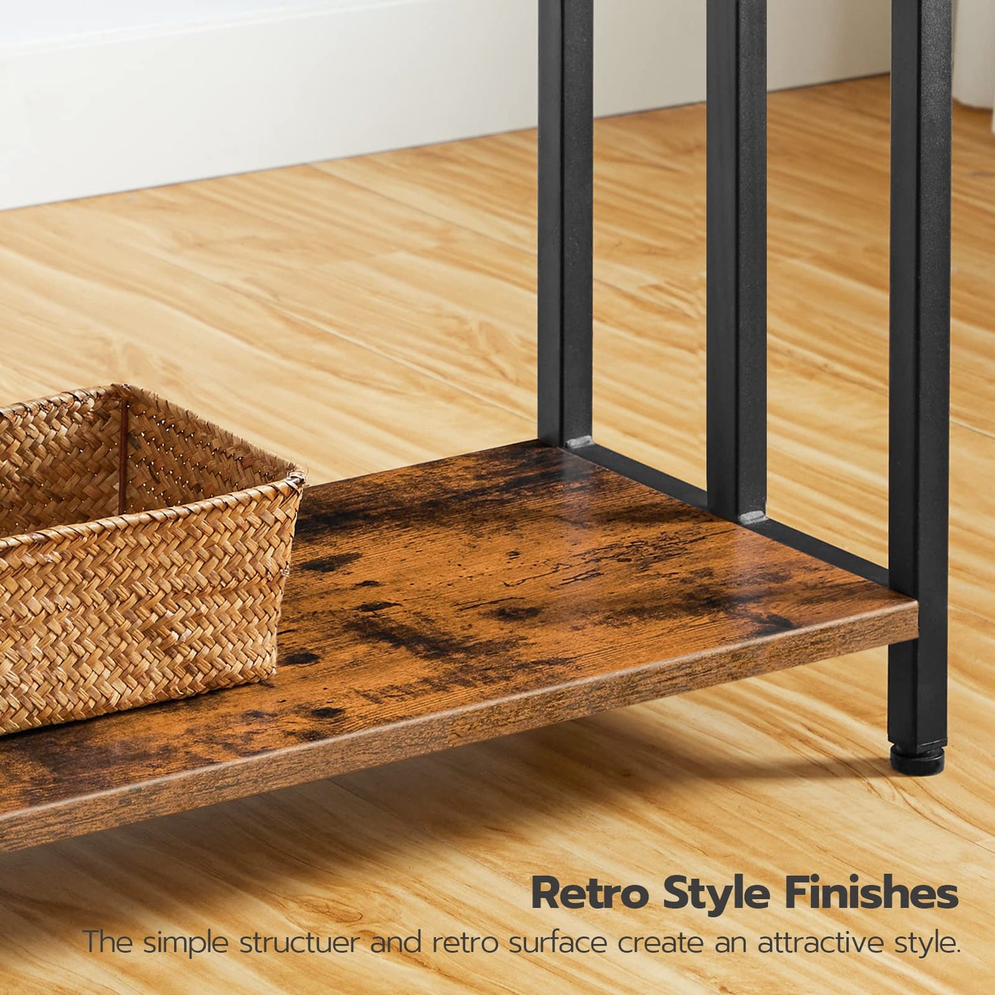 Wooden shelf with black metal frame on a wooden floor, featuring a wicker basket.