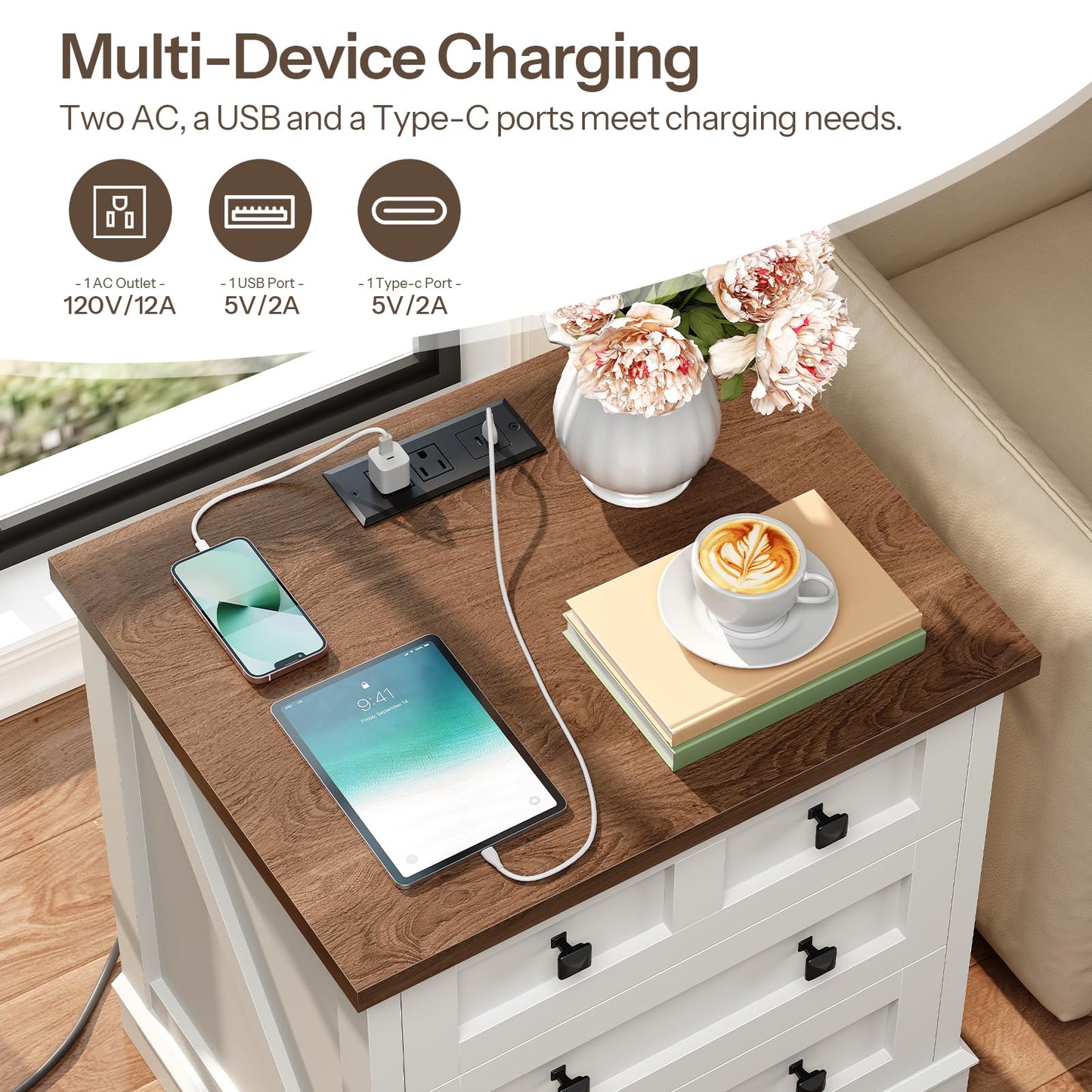 Close-up of the integrated power strip charging multiple smartphones and tablets on the rich brown wooden tabletop.