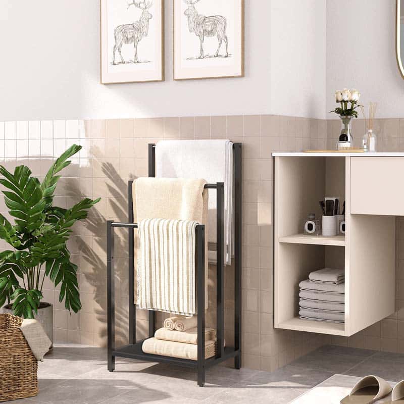 Bathroom with towel rack, shelves, and decorative elements
