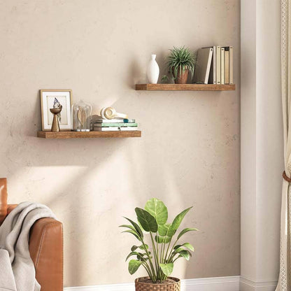 HOOBRO rustic floating shelves set of 2 in vintage brown wood displayed on a living room wall with books and plants.