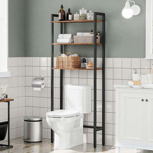 Bathroom with a toilet, over-the-toilet shelf, and tiled walls.