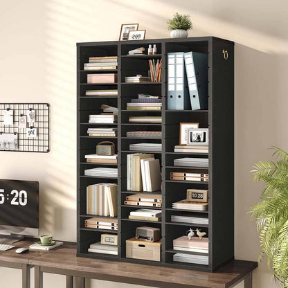 Black bookshelf filled with books and decorative items in a home office setting.
