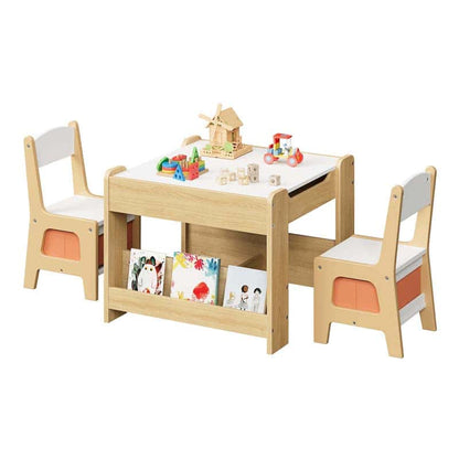 Children's wooden table and chairs set with toys and books on a white background