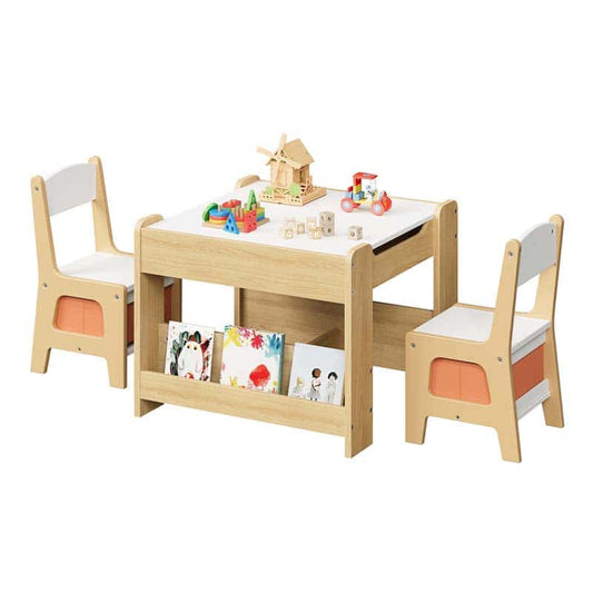Children's wooden table and chairs set with toys and books on a white background
