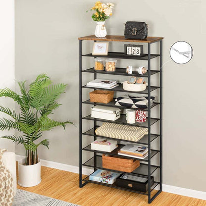 A tall black metal shelving unit with a rustic brown wood top, styled with home decor items in a room corner with a potted plant and wood floor.