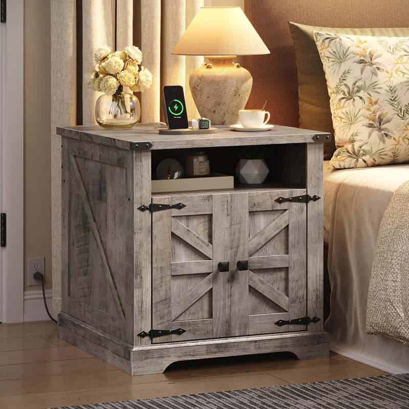 Wooden nightstand with decorative items in a bedroom setting