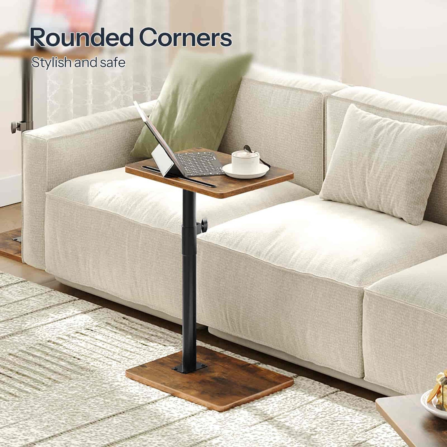 Sofa with a small wooden table next to it, featuring rounded corners.