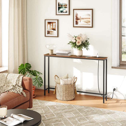 Living room with a console table, sofa, and decorative elements.