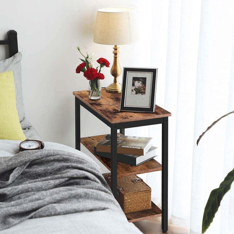 Skinny nightstand bedside table with open shelves for storage in a small space bedroom
