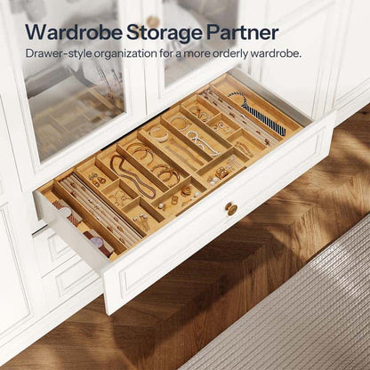 Drawer-style jewelry organizer with jewelry inside, labeled 'Wardrobe Storage Partner'.