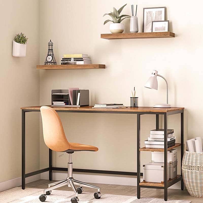 Industrial floating wall shelves installed above a metal computer desk as an organized bookshelf for home office storage.