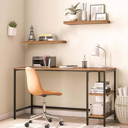 Industrial floating wall shelves installed above a metal computer desk as an organized bookshelf for home office storage.