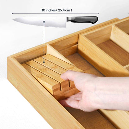 A bamboo knife block organizer with a hand inserting a wooden knife divider, shown with an inset diagram of a knife and a measurement label reading 10 inches (25.4 cm).