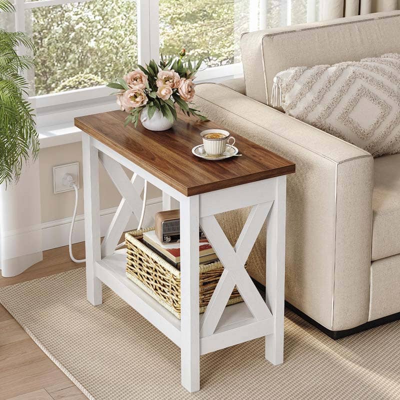 Wooden coffee table with a white base in a living room setting.