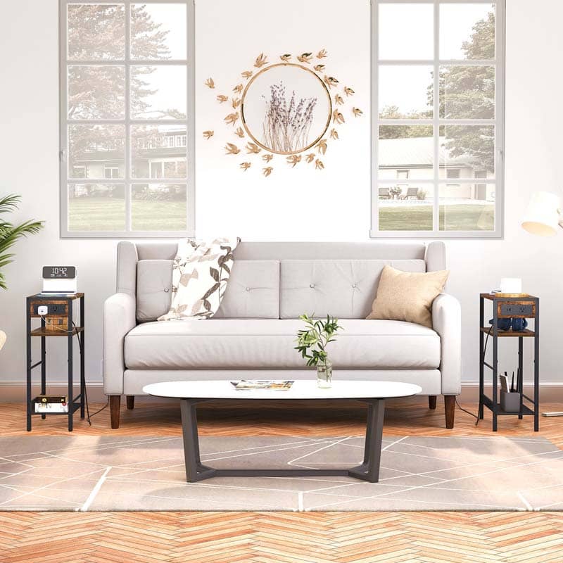 Modern living room with a gray sofa, coffee table, and decorative elements.