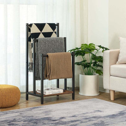 Towel rack with folded towels in a living room setting