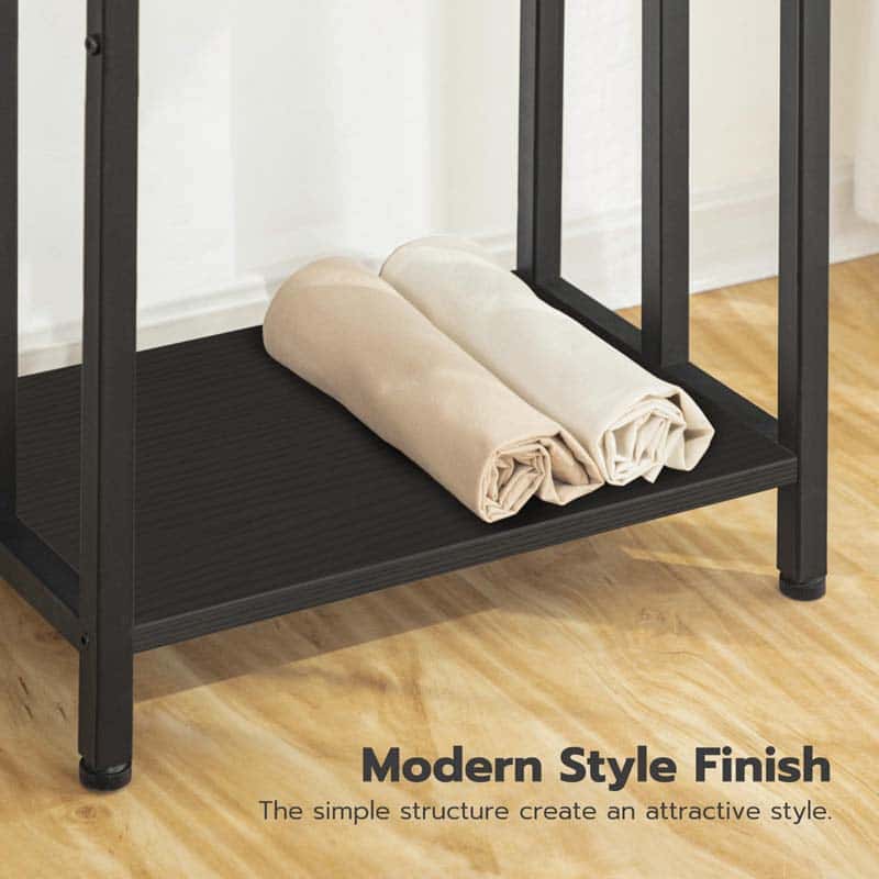 Black metal shelf with folded beige fabric on a wooden floor, text 'Modern Style Finish' displayed.