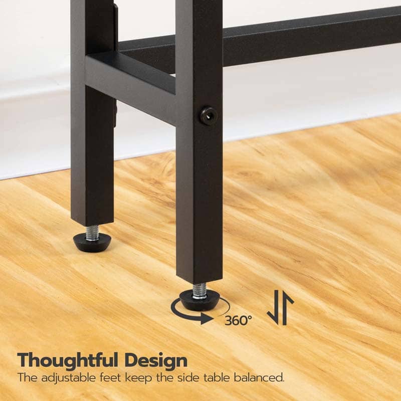 Close-up of a side table with adjustable feet on a wooden floor, featuring text about thoughtful design.