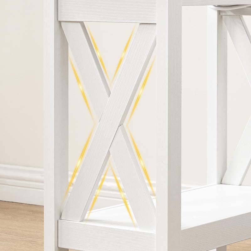 Close-up of a white wooden furniture piece with an X-shaped crossback design and warm yellow LED accent lights glowing behind it.
