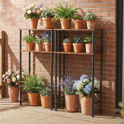 Outdoor setting with a metal shelving unit displaying potted plants against a brick wall.