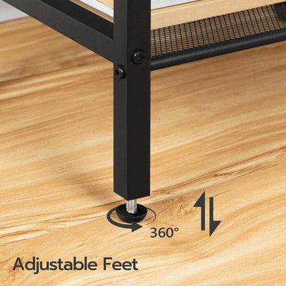 Adjustable foot of a piece of furniture on a wooden floor with 360-degree rotation indication.