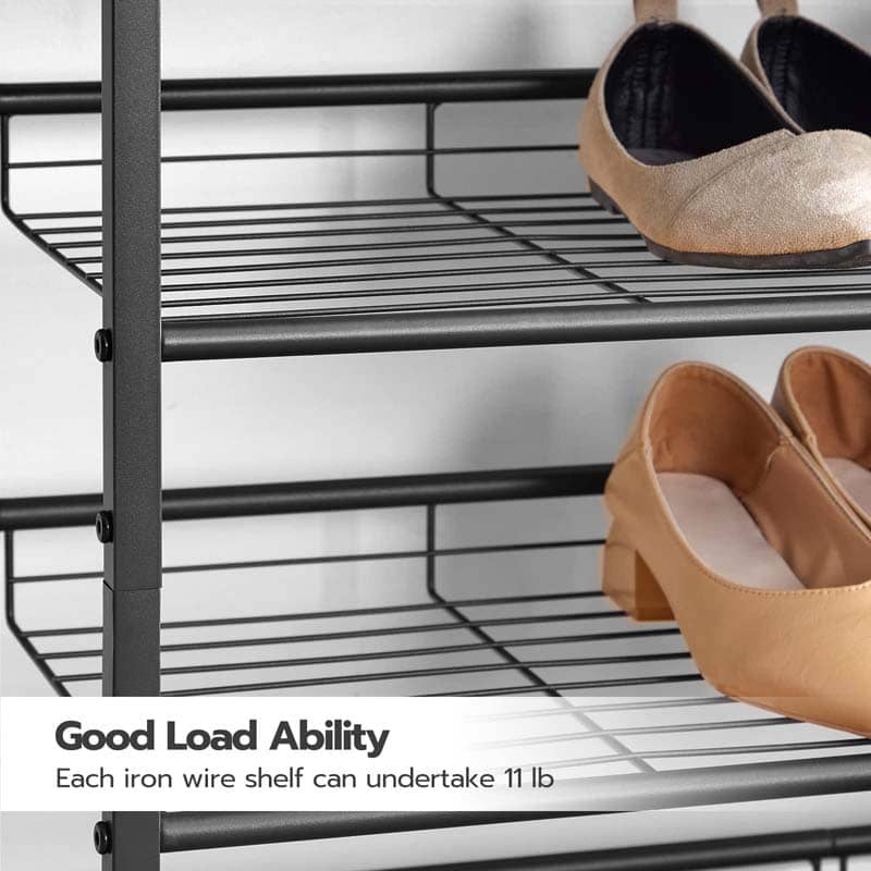 Black metal shoe rack with shoes on a white background