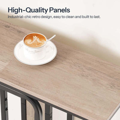 Close up of the water resistant rustic brown wood grain tabletop holding a ceramic cup of latte coffee.