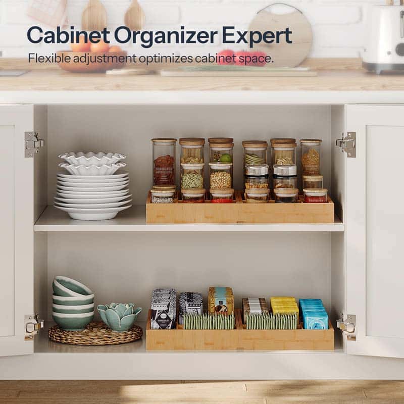 Cabinet organizer with various containers and items inside a kitchen cabinet.