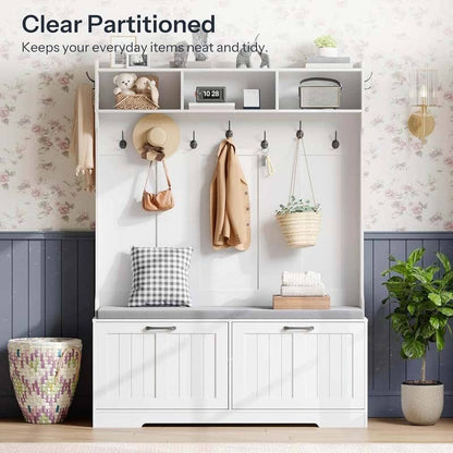 White storage bench with hooks and shelves in a room with floral wallpaper.
