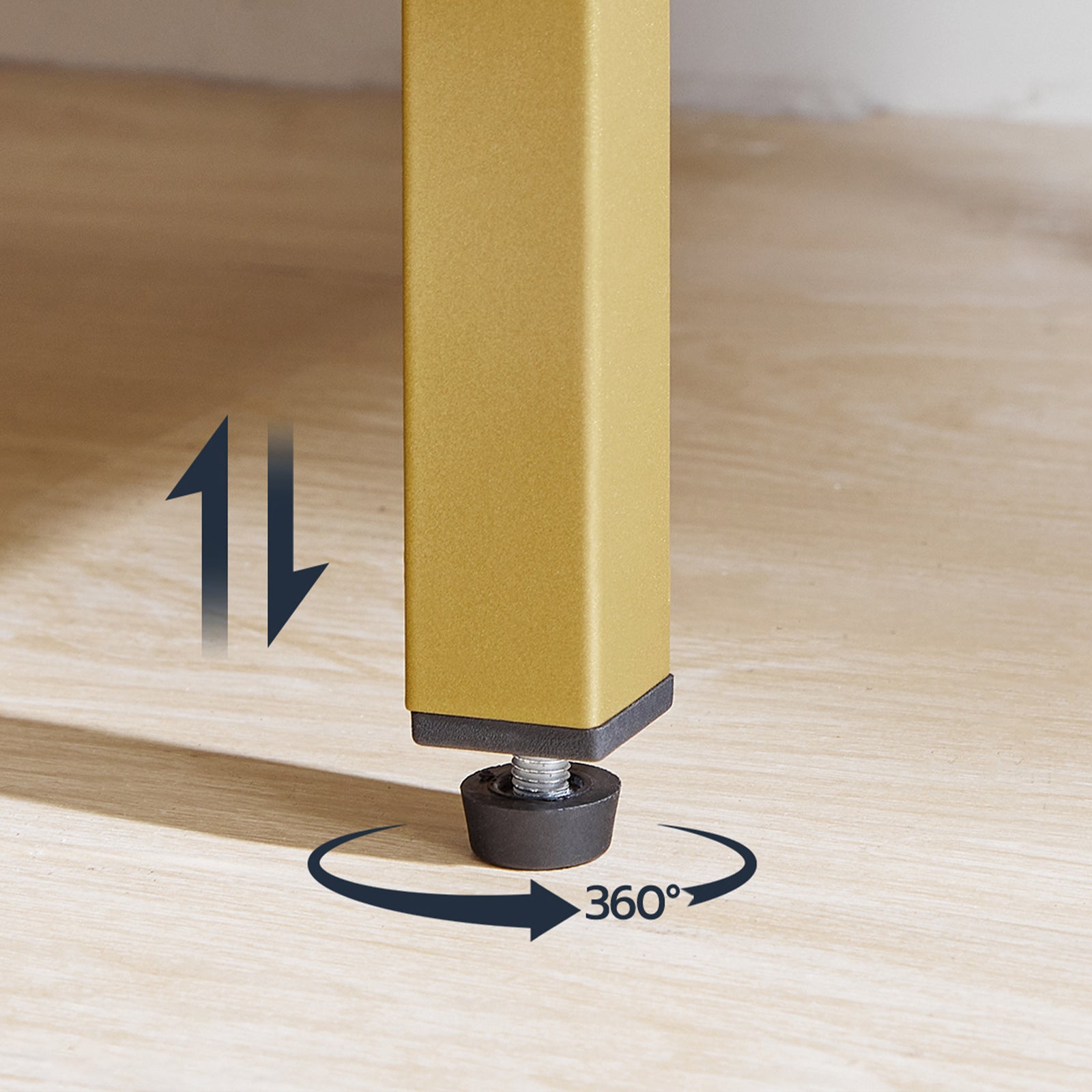 Yellow leg with a 360-degree swivel mechanism on a wooden floor.