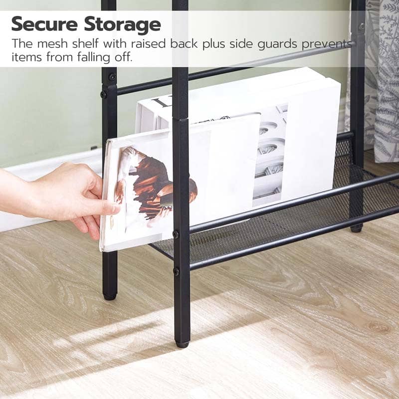Black mesh shelf with raised back and side guards holding a photo frame, on a light wood floor.