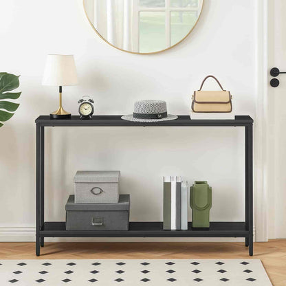 Black console table with decorative items in a room setting