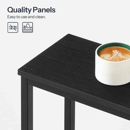 Black table with a cup of coffee on a white background, featuring text about quality panels.