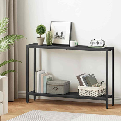 Black console table with decorative items in a living room setting