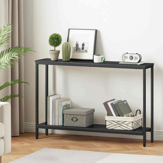 Black console table with decorative items in a living room setting