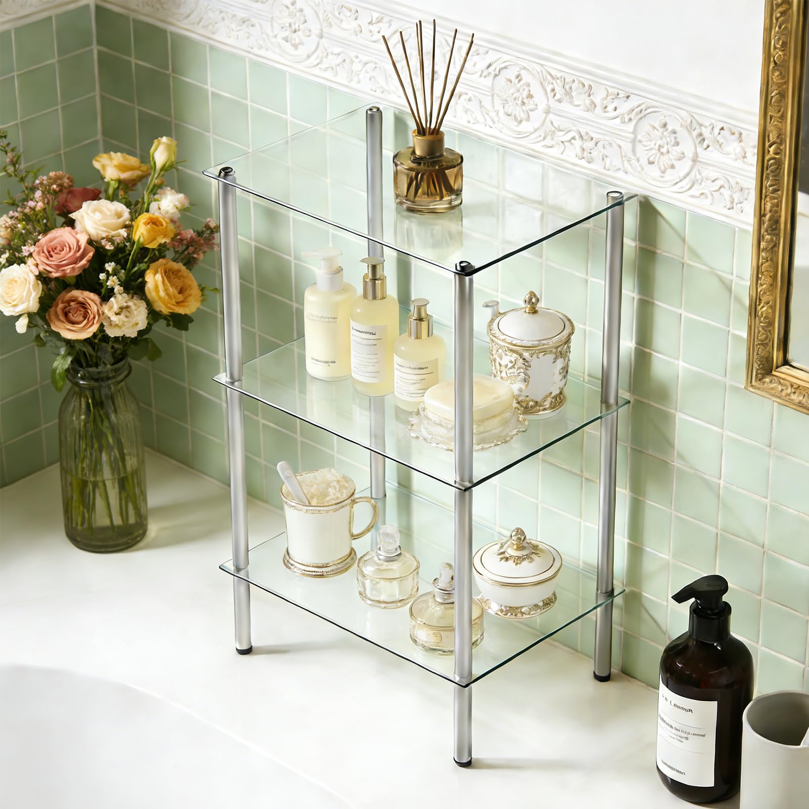Glass shelf with decorative items against a light green tiled wall.