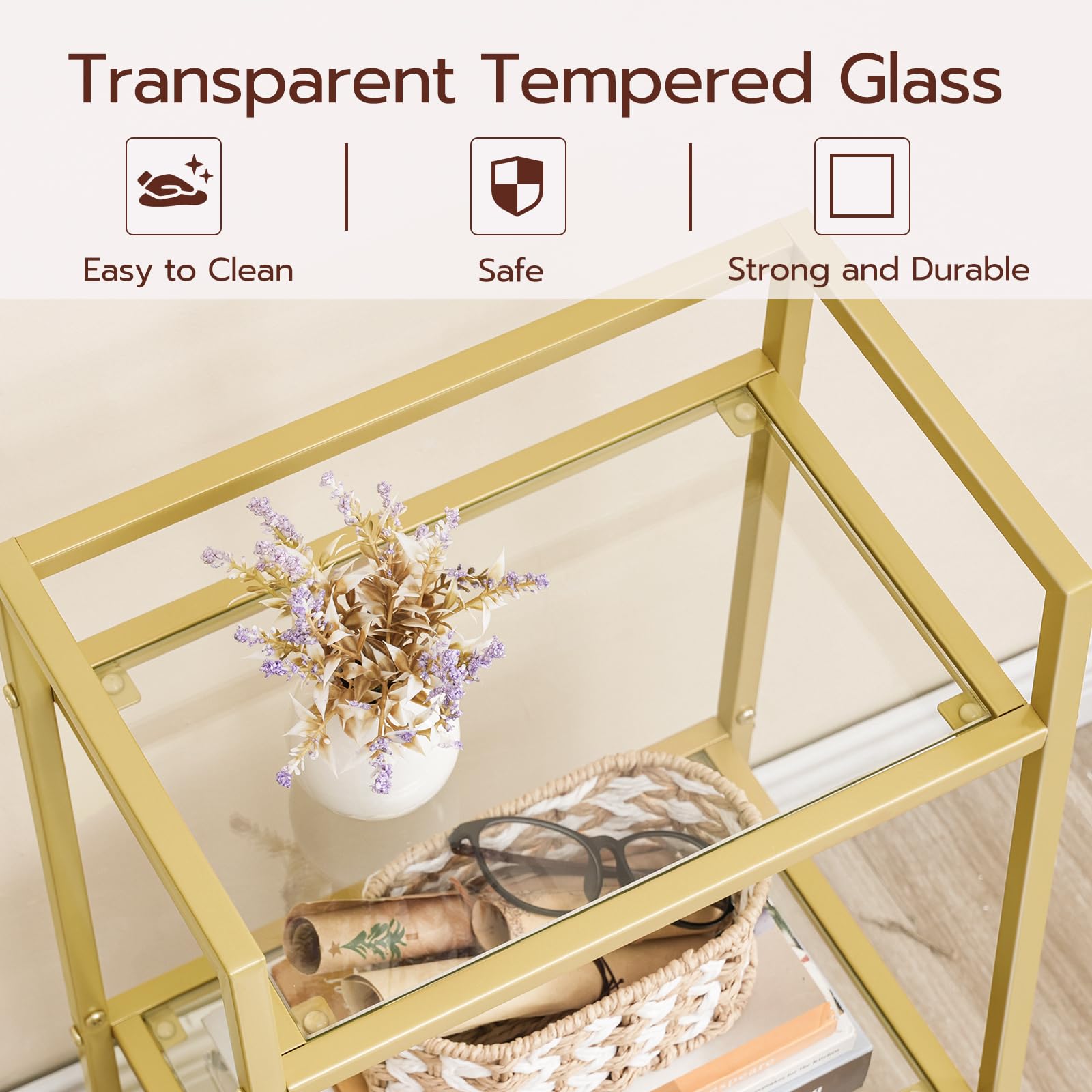 Gold-framed glass table with decorative items on a light background, featuring text on transparent tempered glass.