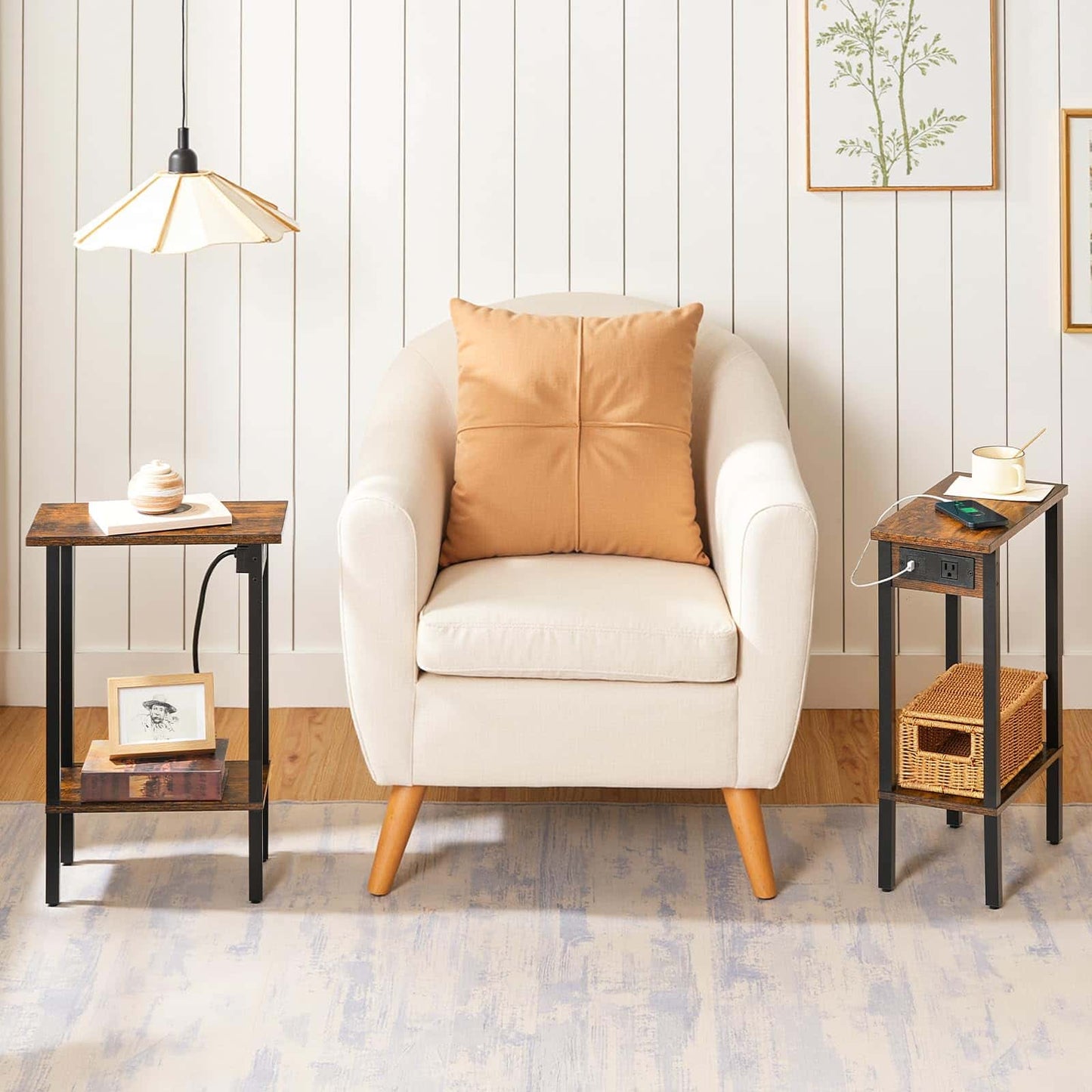 White armchair with a brown pillow in a room with wooden floors and white walls.