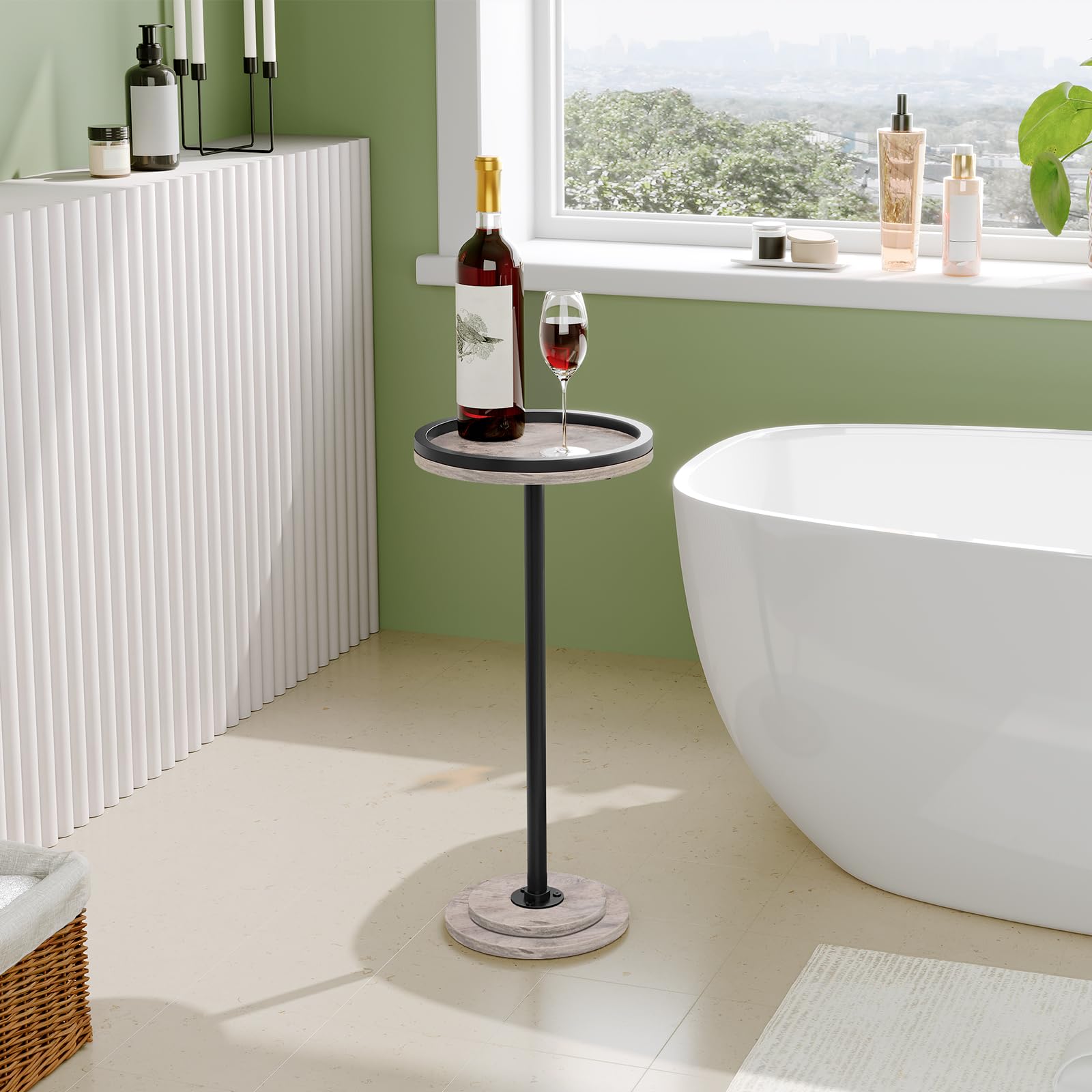 Bathroom setting with a stand holding a bottle and glass, next to a bathtub and window.