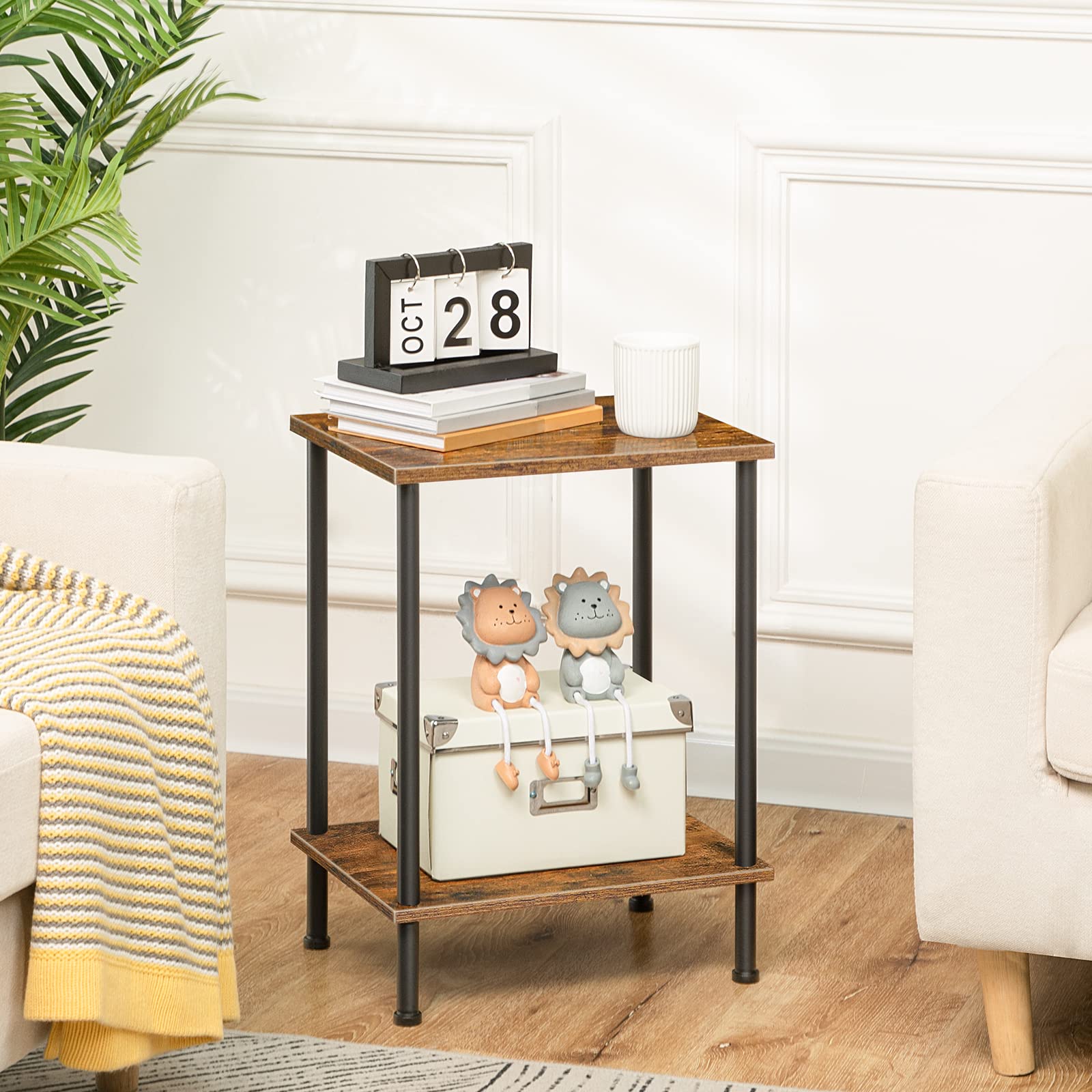 Small wooden side table with decorative items in a living room setting