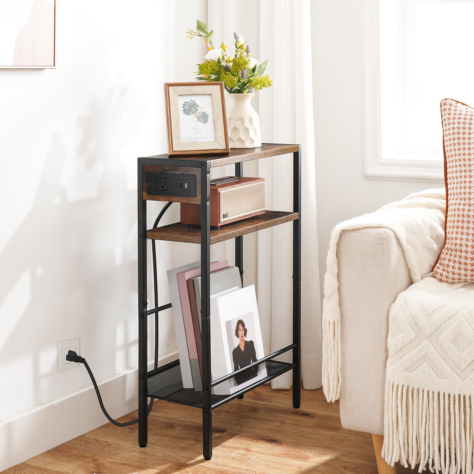 Small wooden side table with decorative items in a living room setting.