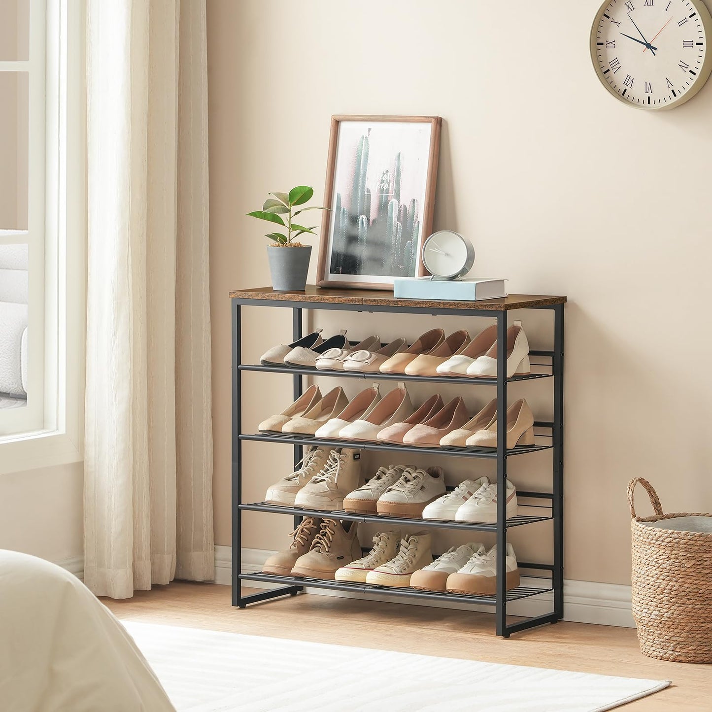 Shoe rack with shoes in a room with a clock and plant on the wall.