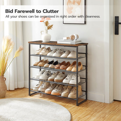 Shoe rack with organized shoes in a room with decor elements.