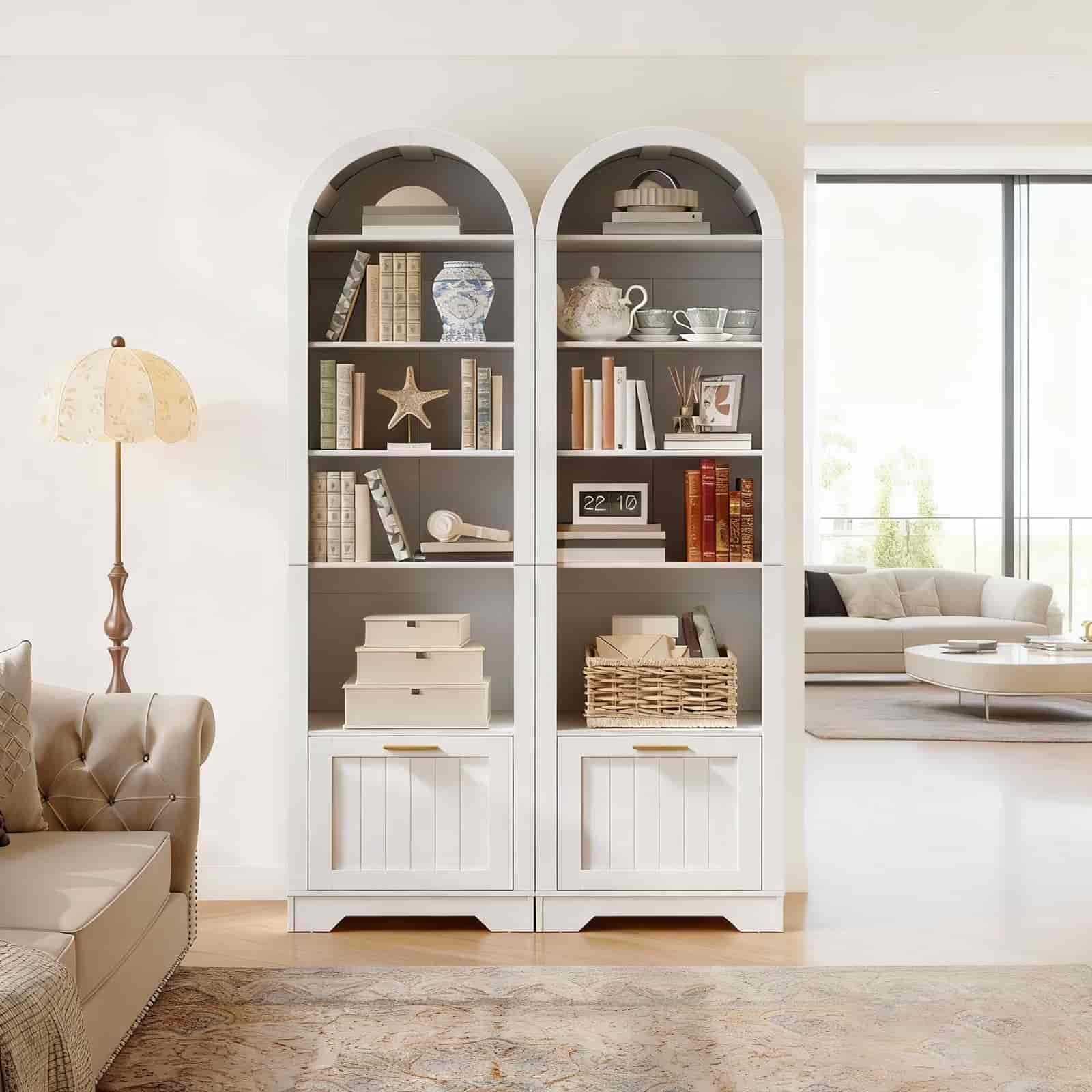 White bookshelves with decorative items in a living room setting