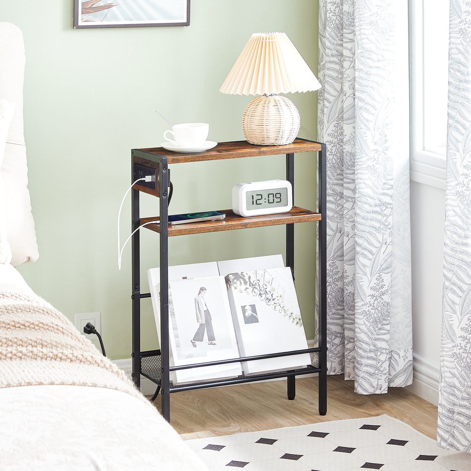 Wooden nightstand with lamp, clock, and books in a bedroom setting