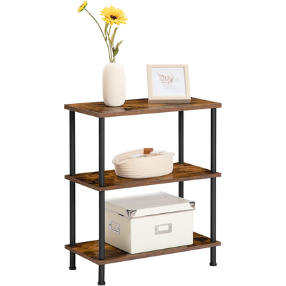 Three-tier wooden shelf with decorative items on a white background