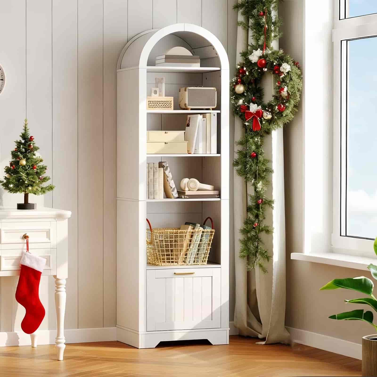 White bookshelf with decorative items in a room with Christmas decorations.