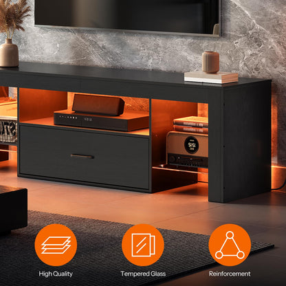 Black entertainment console with open doors revealing electronic devices in a room setting.